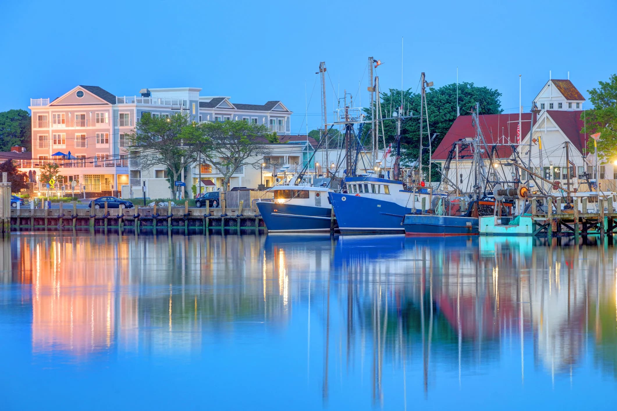 Evening view of Hyannis Main Street with string lights and colorful storefronts