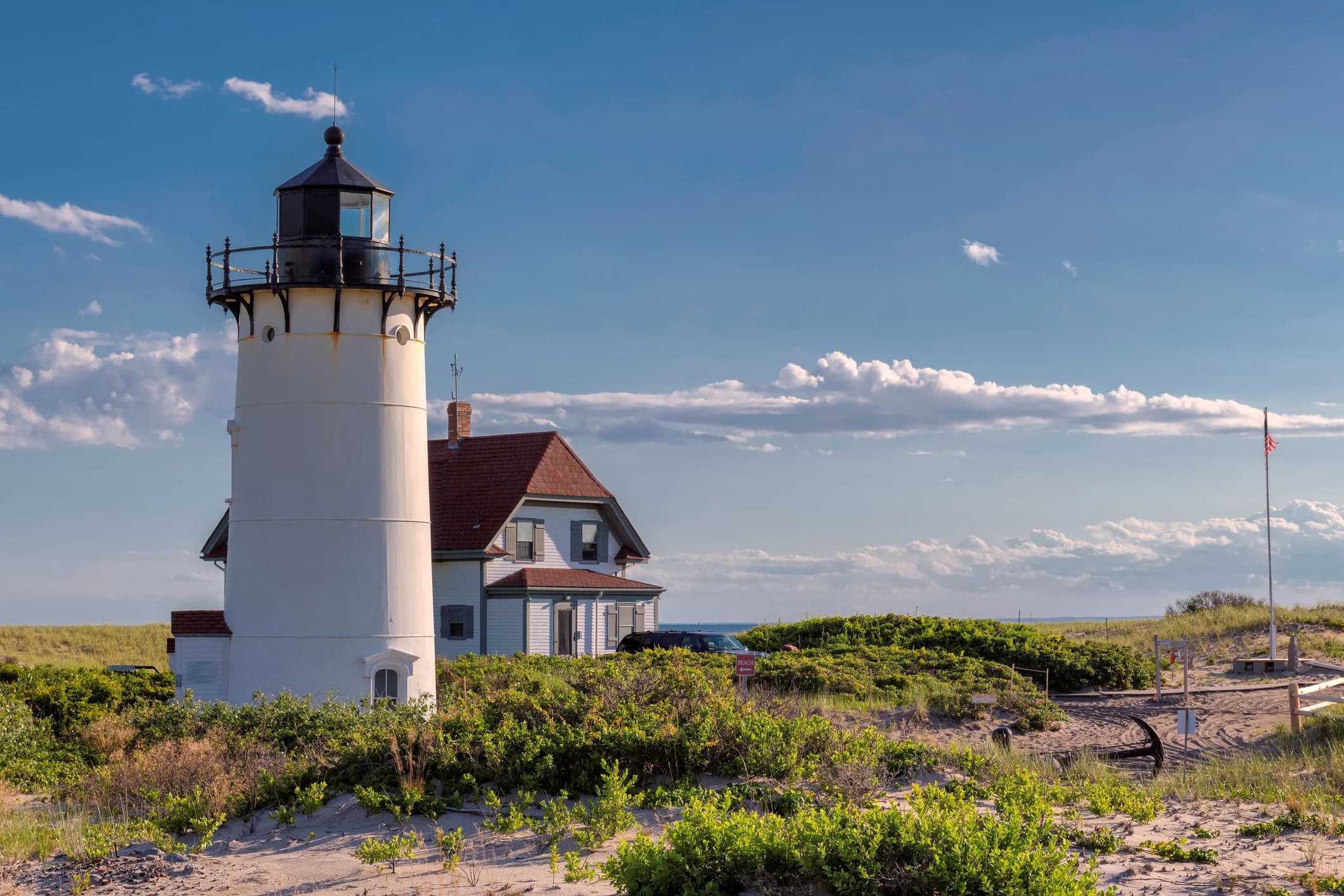 Race Point Lighthouse standing amid the dunes in Provincetown