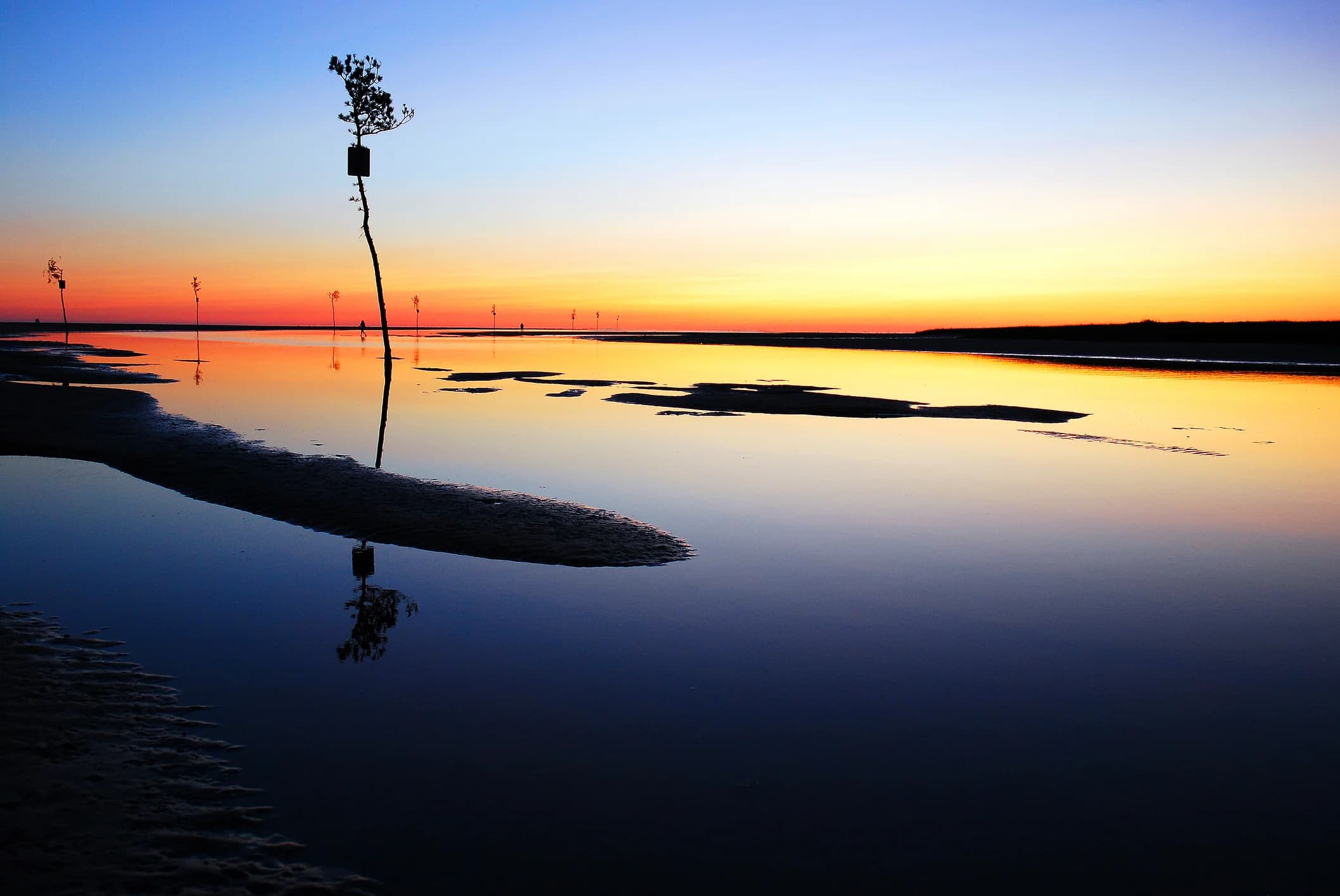 Dramatic sunset over Rock Harbor tidal flats, Cape Cod Bay