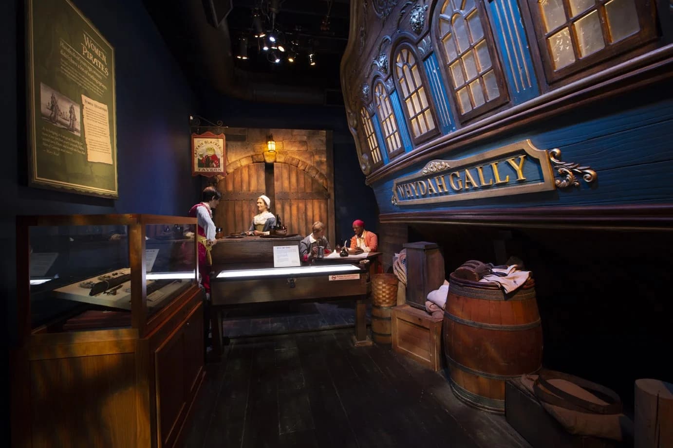 The interior of the Whydah Pirate Museum with the ship replica on display