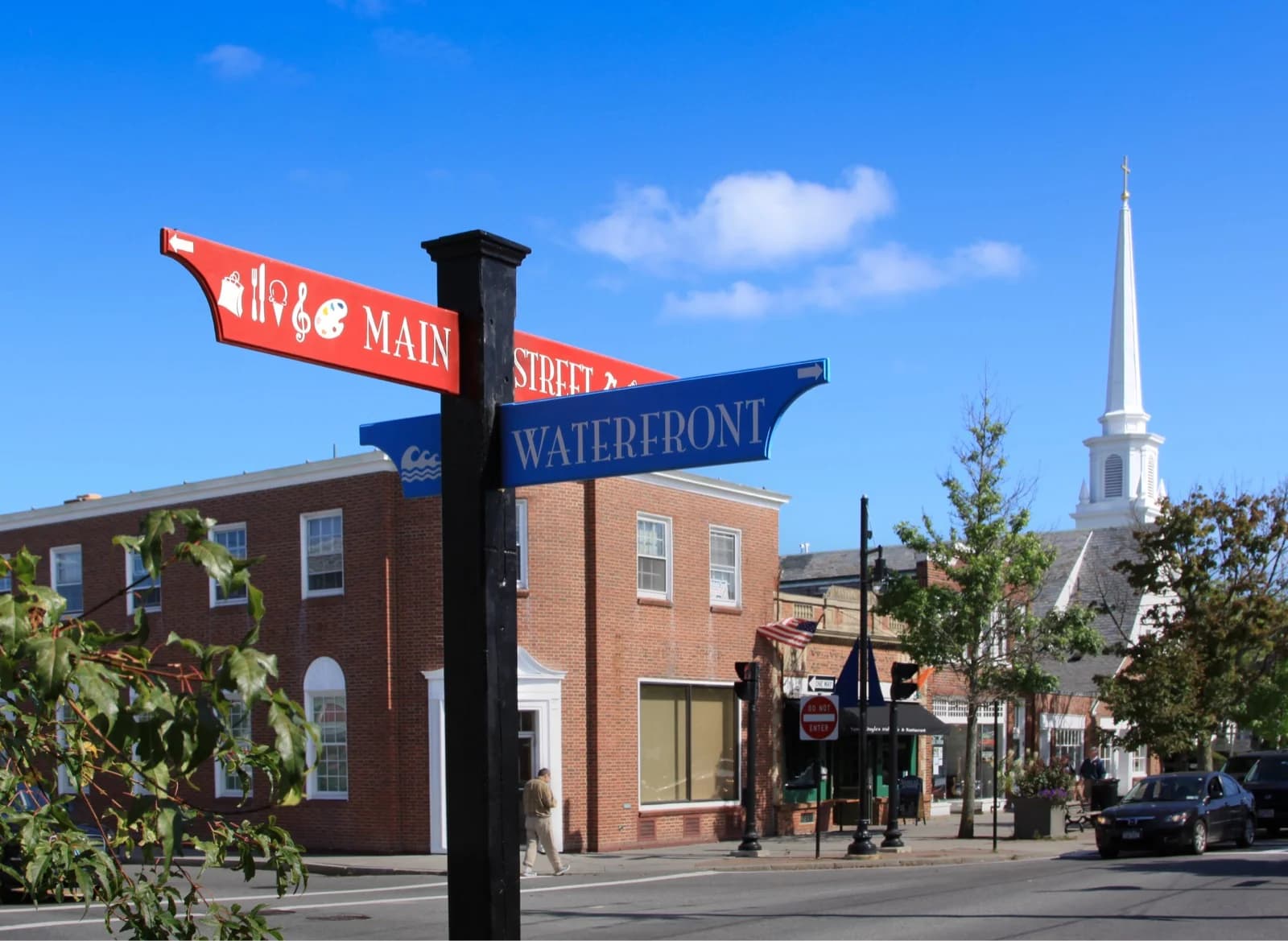 Painted directional signs on a Cape Cod main street